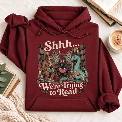 Shhh We're Trying to Read Cryptid Hoodie
