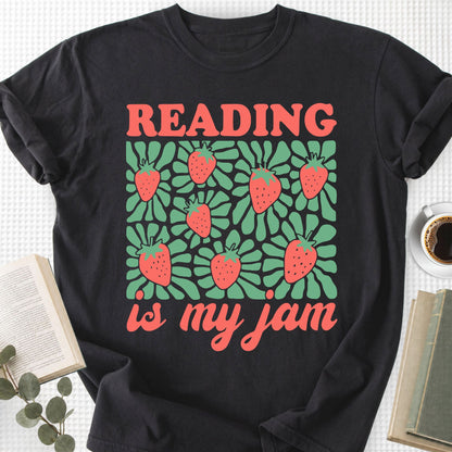 Black t-shirt with 'Reading is my jam' design featuring strawberries on a white background.