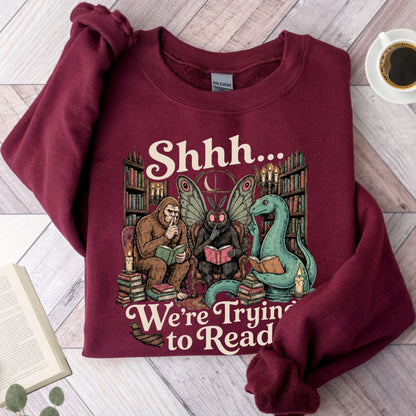 Shhh We're Trying To Read Cryptid Unisex Sweatshirt