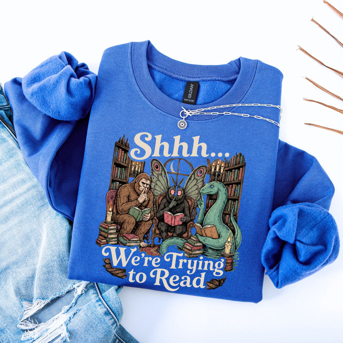 Shhh We're Trying To Read Cryptid Unisex Sweatshirt