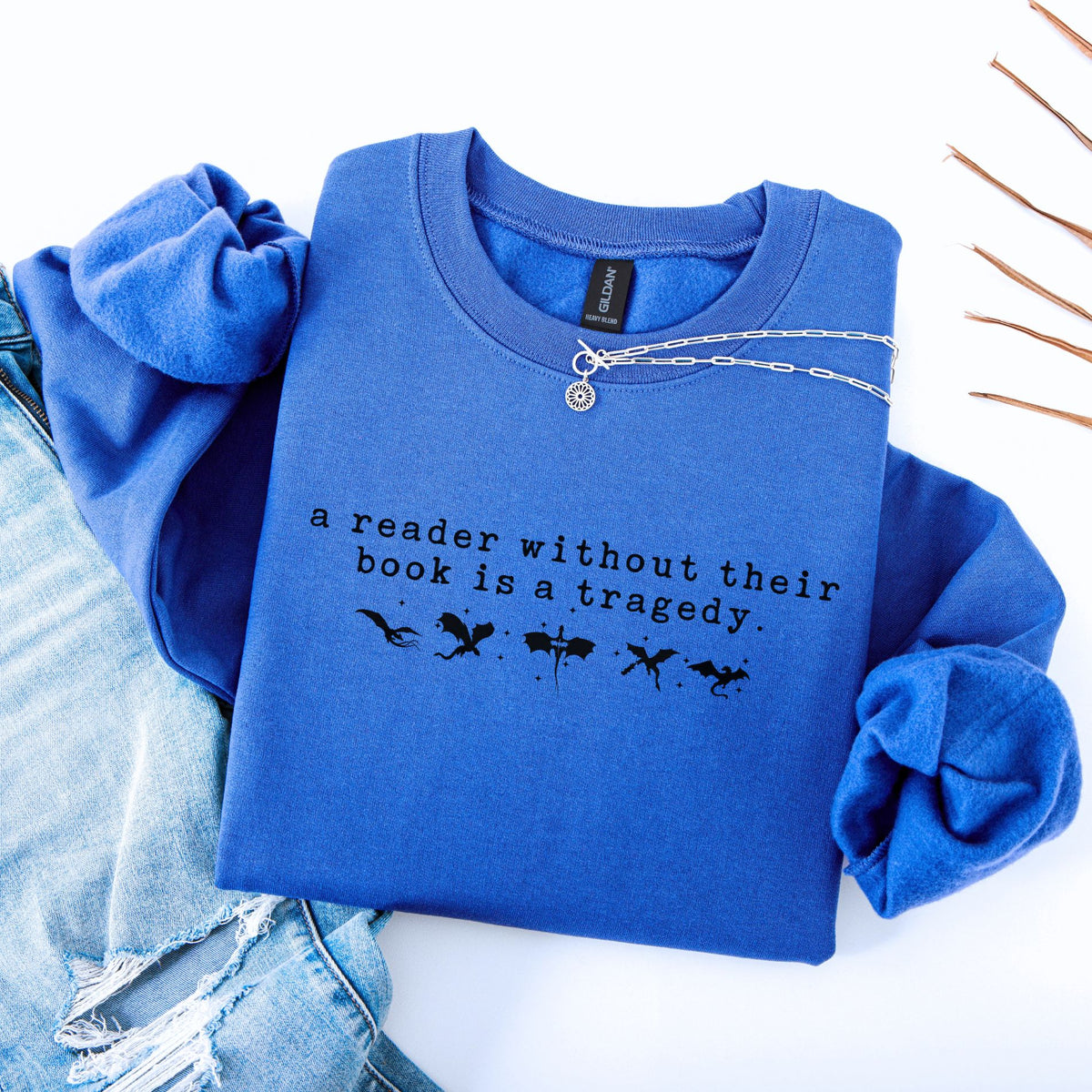 A Reader Without Their Book Is A Tragedy Unisex Sweatshirt