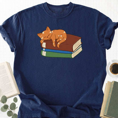 Cute Cat Sleeping on Books Unisex T-Shirt - Book Social Club