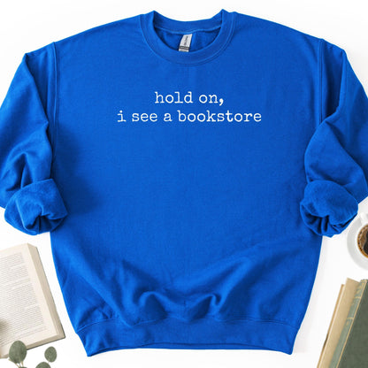 Hold On, I See A Bookstore Unisex Sweatshirt - Book Social Club